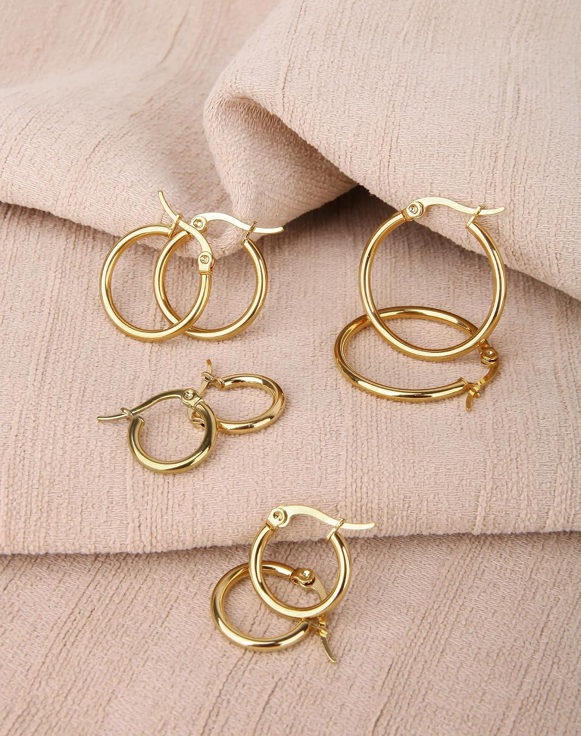 4 Pairs Gold Hoop Earrings for Women. Surgical Steel Small Huggie Set | 14K Gold Plated Stainless Steel. Hypoallergenic. 10/12/15/20mm. Snap Closure. Lightweight. Dangle.